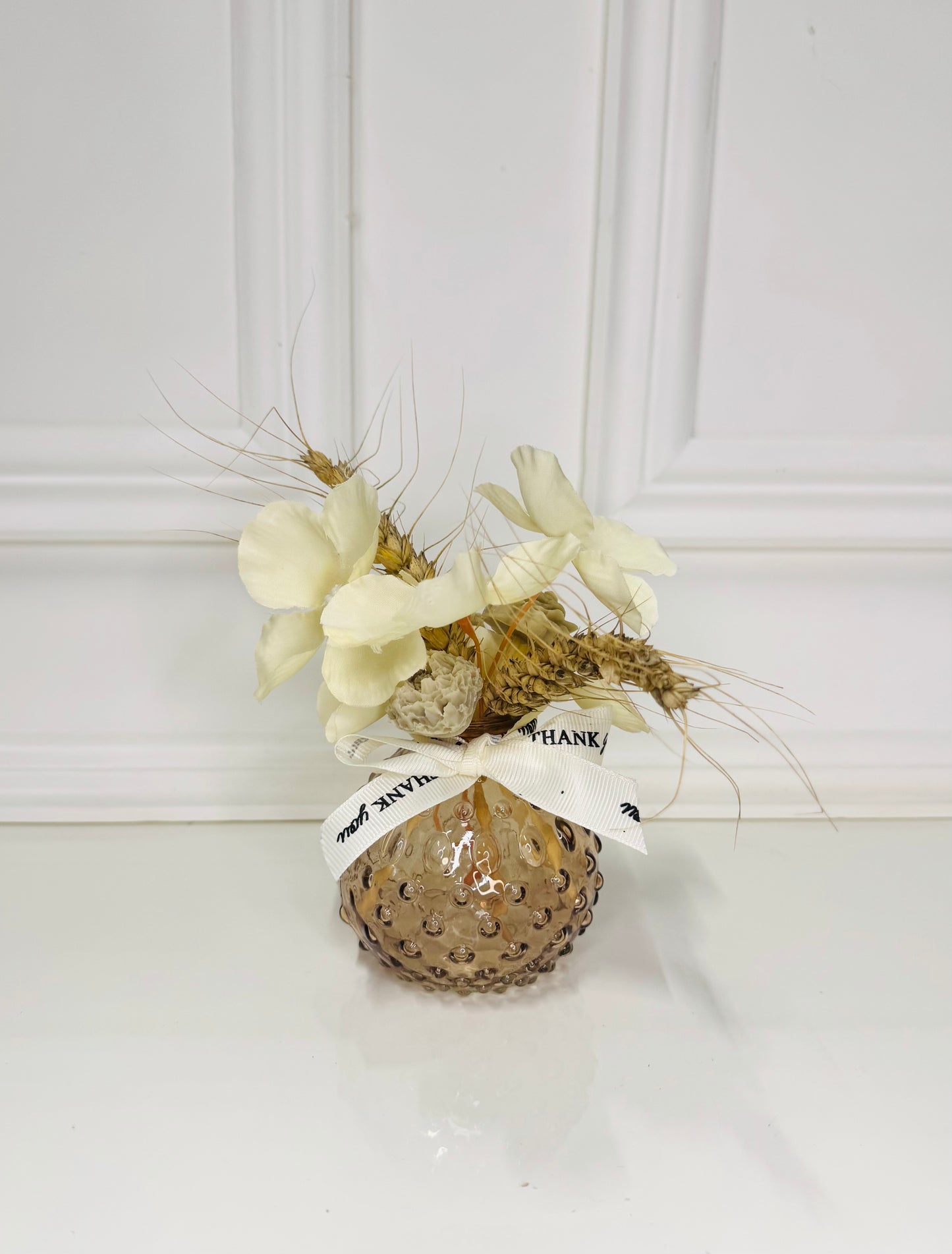 Petit vase adoucissant